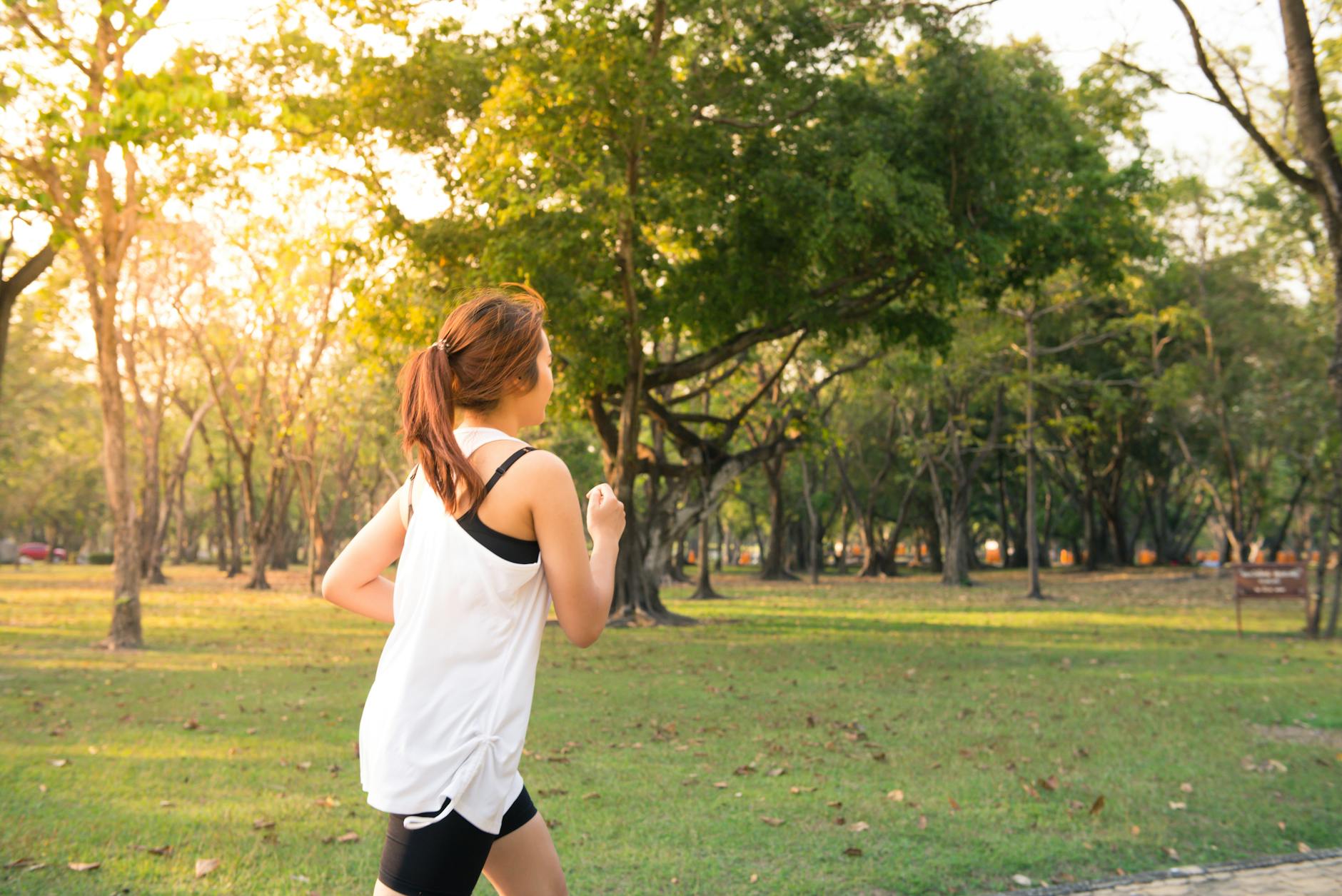 woman about to run during golden hour